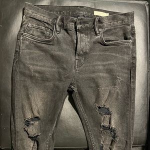All Saints cigarettes black ripped jeans